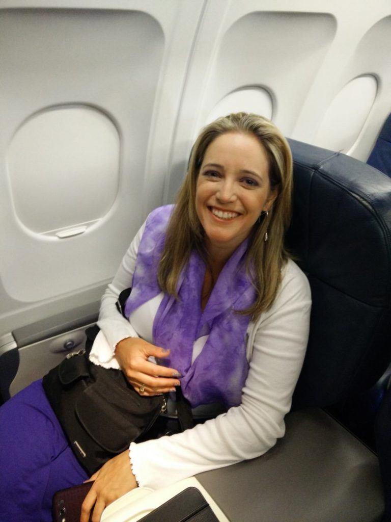 Celebrating our first class upgrades after our previous flight was cancelled mid-air due to a plane malfunction.
